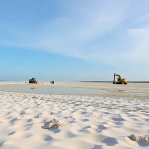 Renovation work on Hilton Head Island beach with construction equipment.